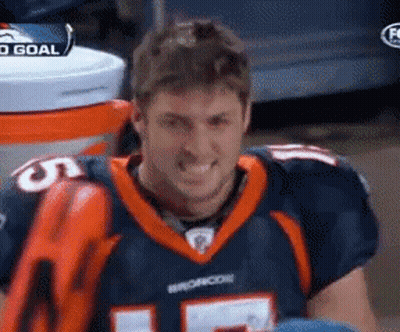 Man In Broncos Jersey Smiling At Camera GIF