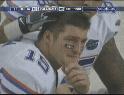 Man In Broncos Jersey Smiling At Camera GIF