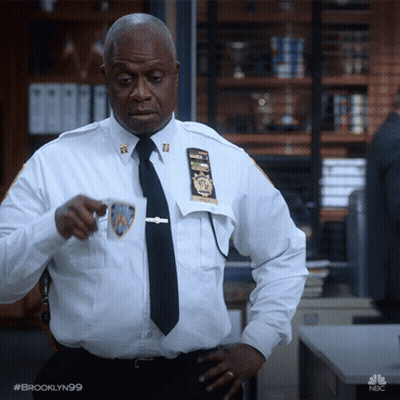 Man In Brooklyn 99 Uniform Holding Coffee Cup GIF