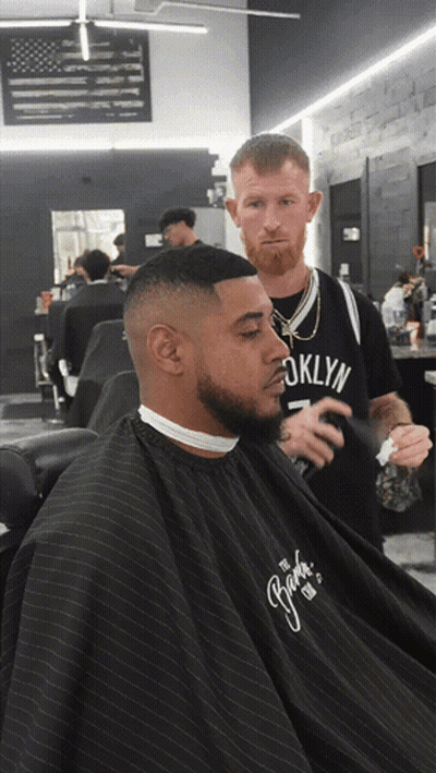 Man In Brooklyn Jersey Getting Barber Haircut GIF