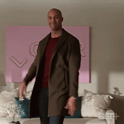 Man In Brown Coat In Front Of Couch First Wives Club GIF