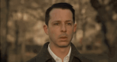 Man In Brown Coat Serious Look GIF