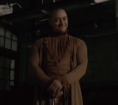 Man In Brown Dress Shaking Hands GIF