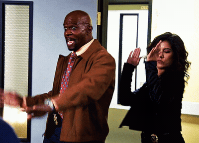 Man In Brown Jacket And Tie Next To Woman GIF
