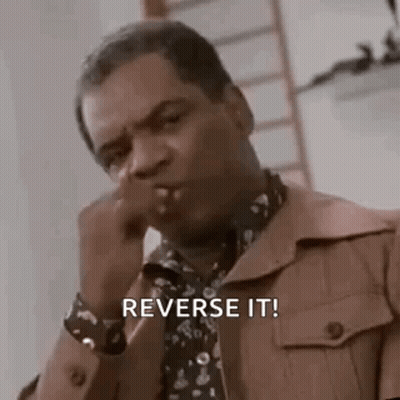 Man In Brown Jacket And Tie Smoking Saying Reverse It GIF