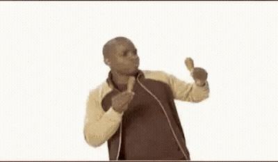Man In Brown Jacket Eating Chicken Wing GIF