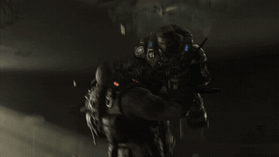 Man In Brown Jacket Holding Another Man's Neck In Dark Room GIF