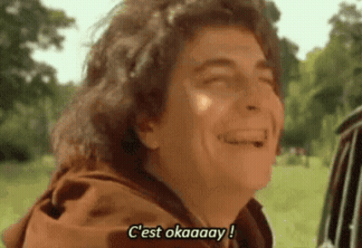 Man In Brown Jacket Laughing Saying C'est Okaaay GIF