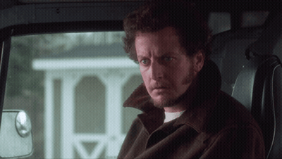 Man In Brown Jacket Sitting In Back Seat Of Car GIF