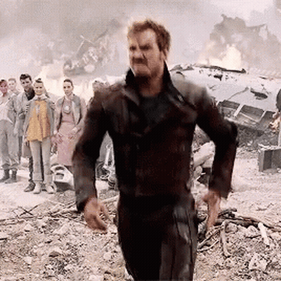 Man In Brown Jacket Walking GIF