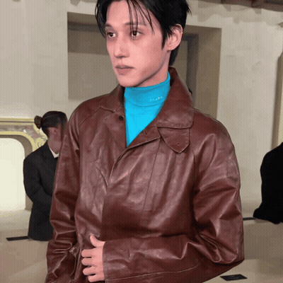 Man In Brown Leather Jacket And Blue Prada Shirt GIF