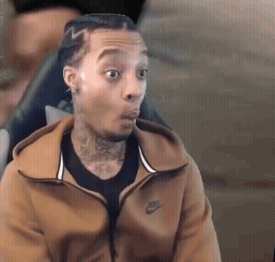 Man In Brown Nike Jacket Sitting Mouth Open GIF