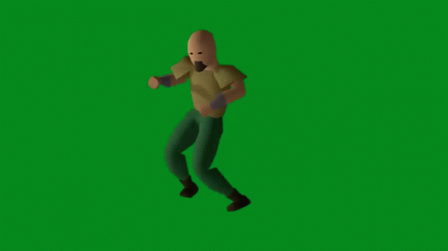 Man In Brown Shirt And Green Pants Standing On Green Screen GIF
