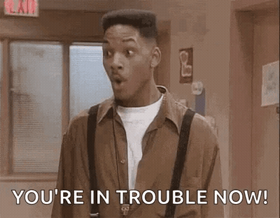 Man In Brown Shirt And Suspenders In Hallway GIF