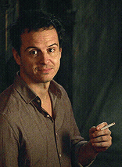 Man In Brown Shirt Holding Cigarette GIF