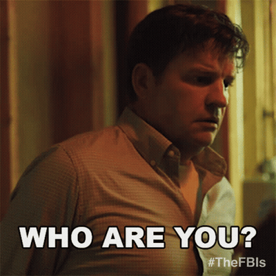 Man In Brown Shirt Says Who Are You GIF