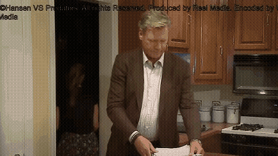 Man in Brown Suit at Stove