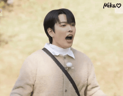 Man In Brown Sweater White Shirt Hands Up GIF