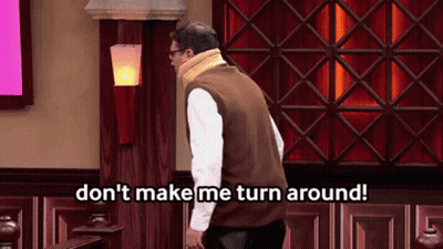 Man In Brown Vest Saying Don't Make Me Turn Around GIF
