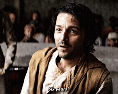 Man In Brown Vest Says Six Years GIF