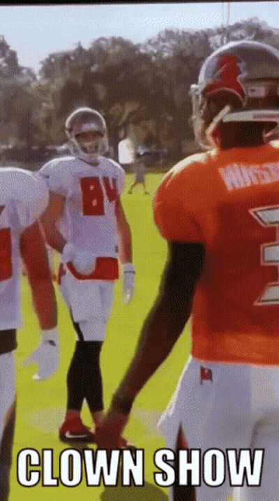 Man In Browns Jersey On Beach With Horses GIF