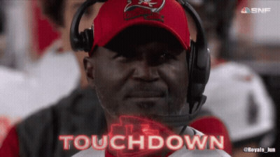 Man In Buccaneers Hat And Headphones Saying Touchdown GIF