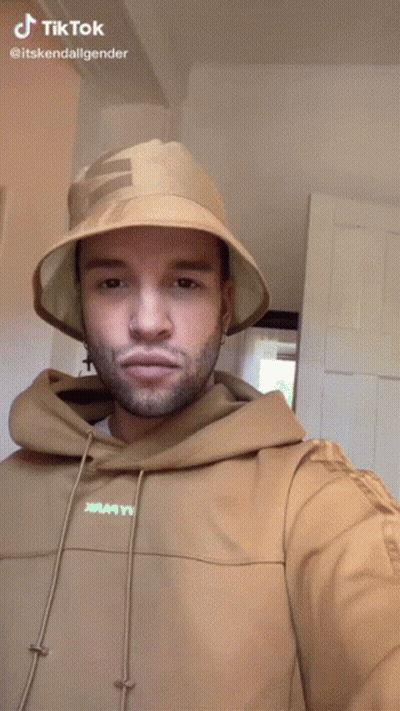 Man In Bucket Hat And Hoodie Making Funny Face Saying TikTok GIF