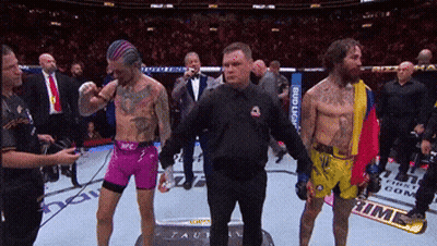 Man In Bud Light Shirt Between Two Boxers GIF