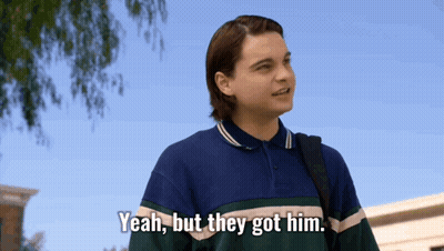 Man In Bugs Bunny Costume Talk To Man In White Shirt GIF