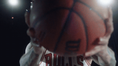 Man In Bulls Jersey Holding Basketball GIF