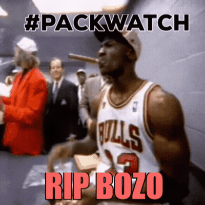 Man In Bulls Jersey Smoking Cigar #Packwatch Rip Bozo GIF