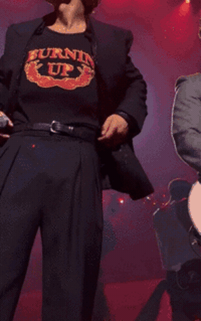 Man In Burning Up T-Shirt Holding Microphone GIF