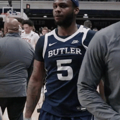 Man In Butler 5 Jersey Stands On Court GIF