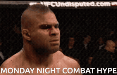 Man In Cage Saying Monday Night Combat Hype GIF