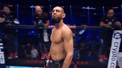 Man In Cage With Crypto.co Sign GIF