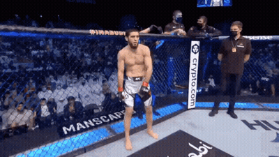 Man In Cage With Crypto.com Sign GIF