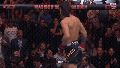 Man In Cage With Crypto Sign GIF