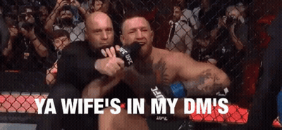 Man In Cage With Microphone And DMs GIF