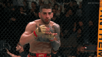 Man In Cage With NFC On Arm GIF