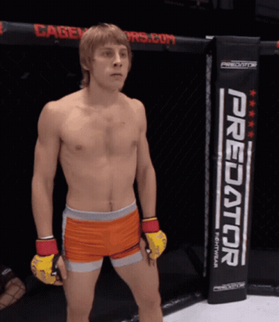 Man In Cage With Predator Sign GIF