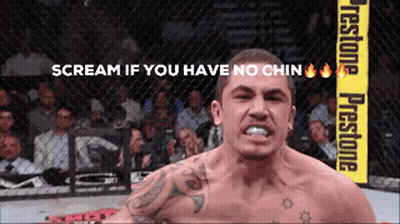 Man In Cage With Sign Scream If You Have No Chin GIF