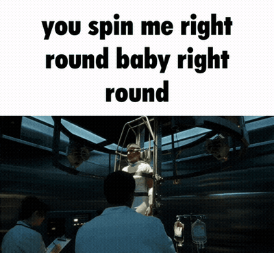 Man In Cage You Spin Me Right Round Baby Right Round GIF