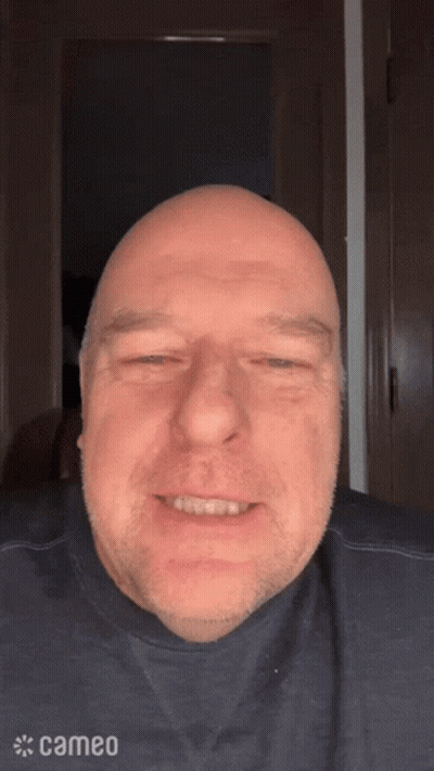 Man In Cameo Shirt Smiling GIF