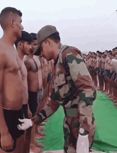 Man In Camouflage Uniform GIF