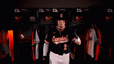 Man In Campbell Jersey Holding Up Gloves GIF