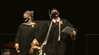 Man In Cap And Gown With C GIF