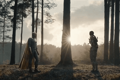 Man In Cape Next To Man In Suit GIF