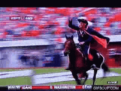 Man In Cape Riding Horse In Front Of Washington Sign GIF