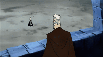 Man In Cape Standing Before Statue GIF