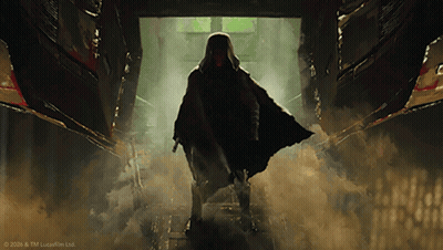 Man In Cape Standing In Dark Hallway GIF